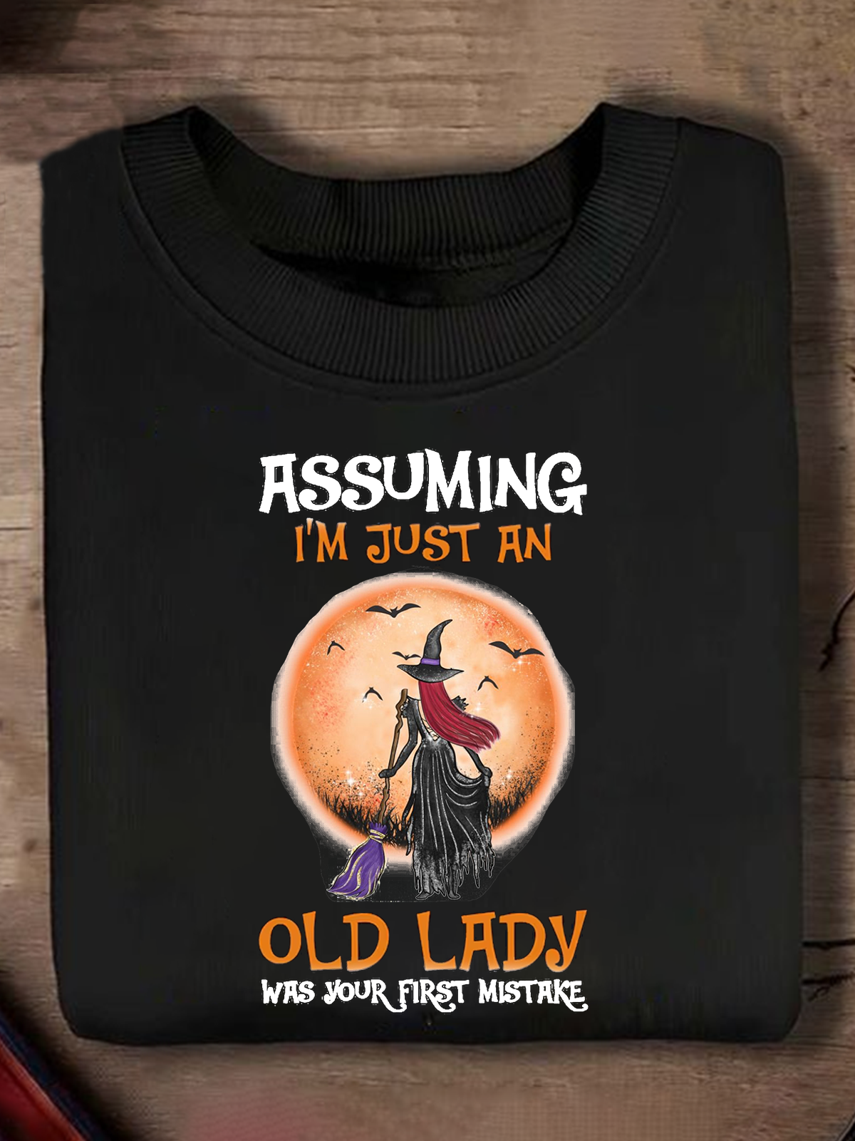 Assuming I'm Just An Old Lady Was Your First Mistake witch Halloween Sweatshirt